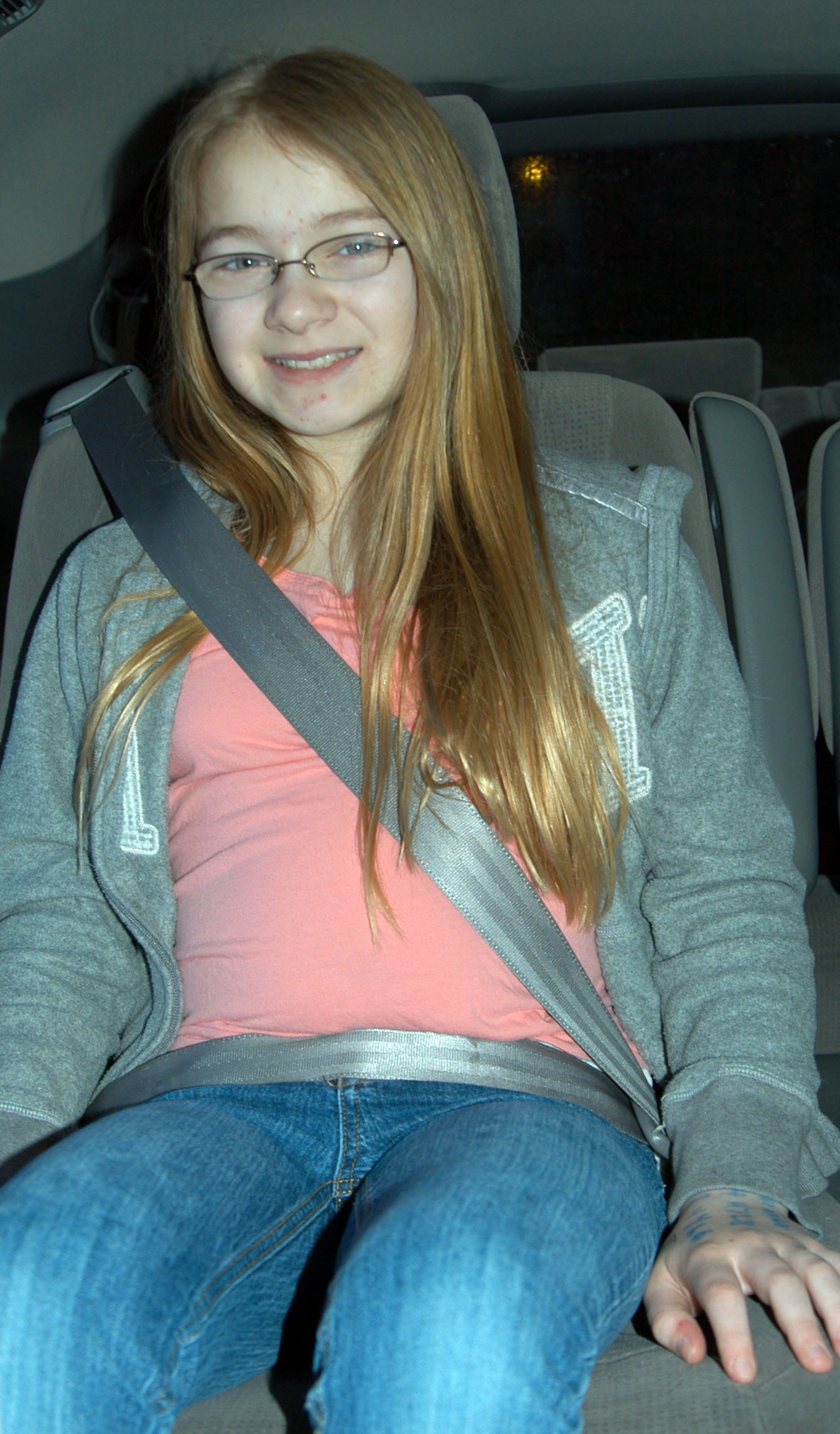 Older child in seatbelt.